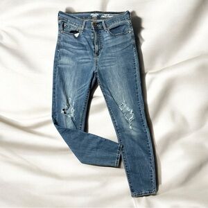 Blue Skinny Jeans with Distressed Details